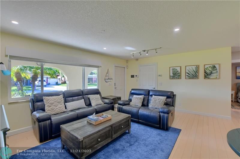 331 Southeast 4th Street Deerfield Beach, FL 33441 - Photo 7 of 37 a living room with furniture and a rug