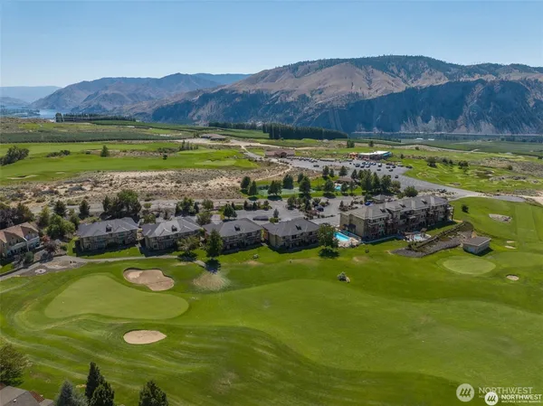 a view of an ocean and swimming pool