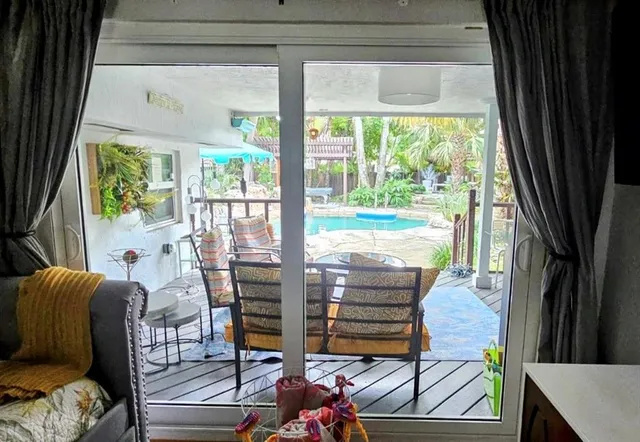 a view of a living room and dining room