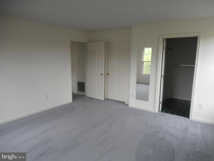 693 Winding Stream Way, Unit 302 Odenton, MD 21113 - Photo 20 of 26 a view of empty room