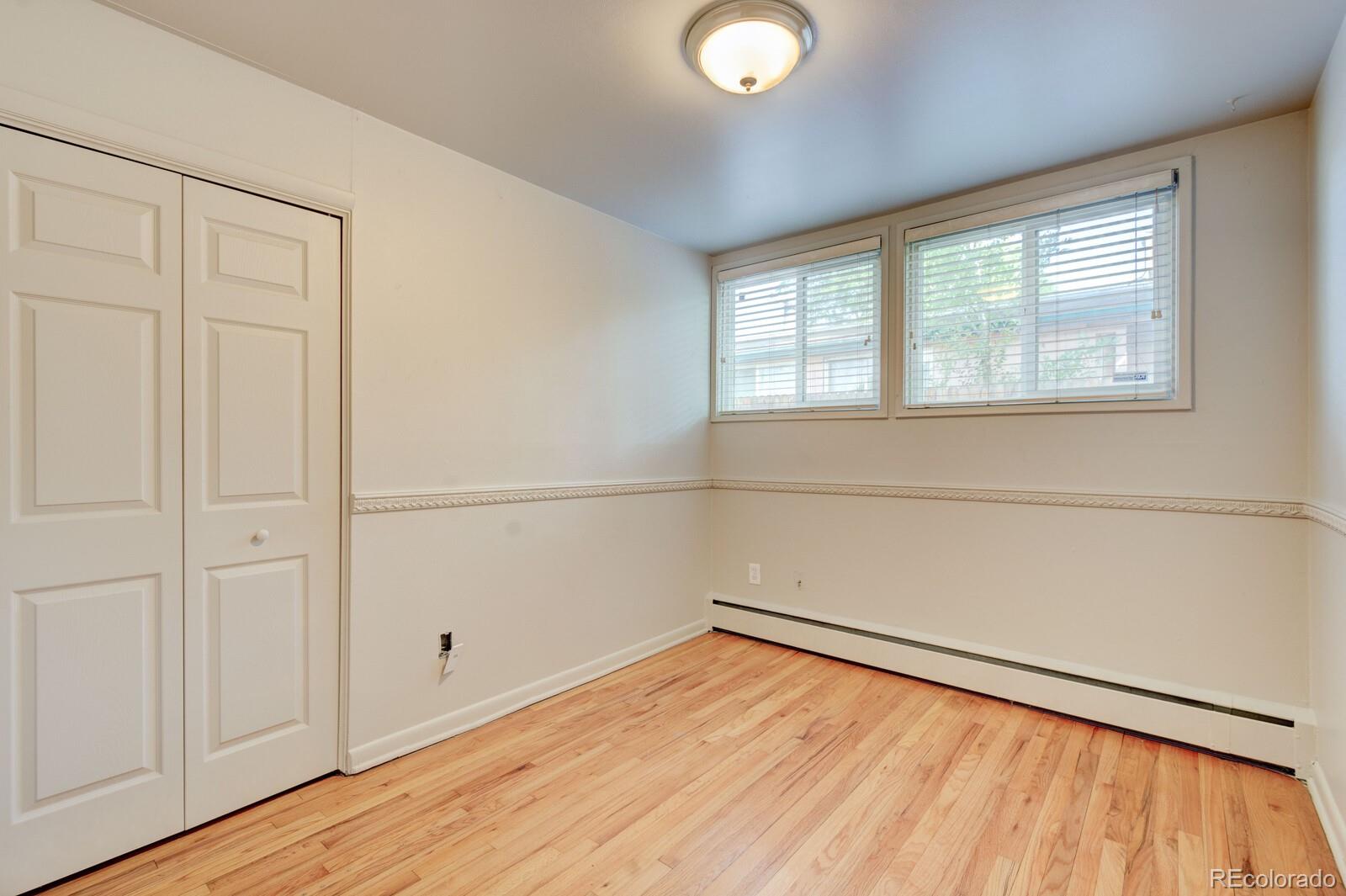 7928 Raleigh Place Westminster, CO 80030 - Photo 14 of 24 an empty room with a window