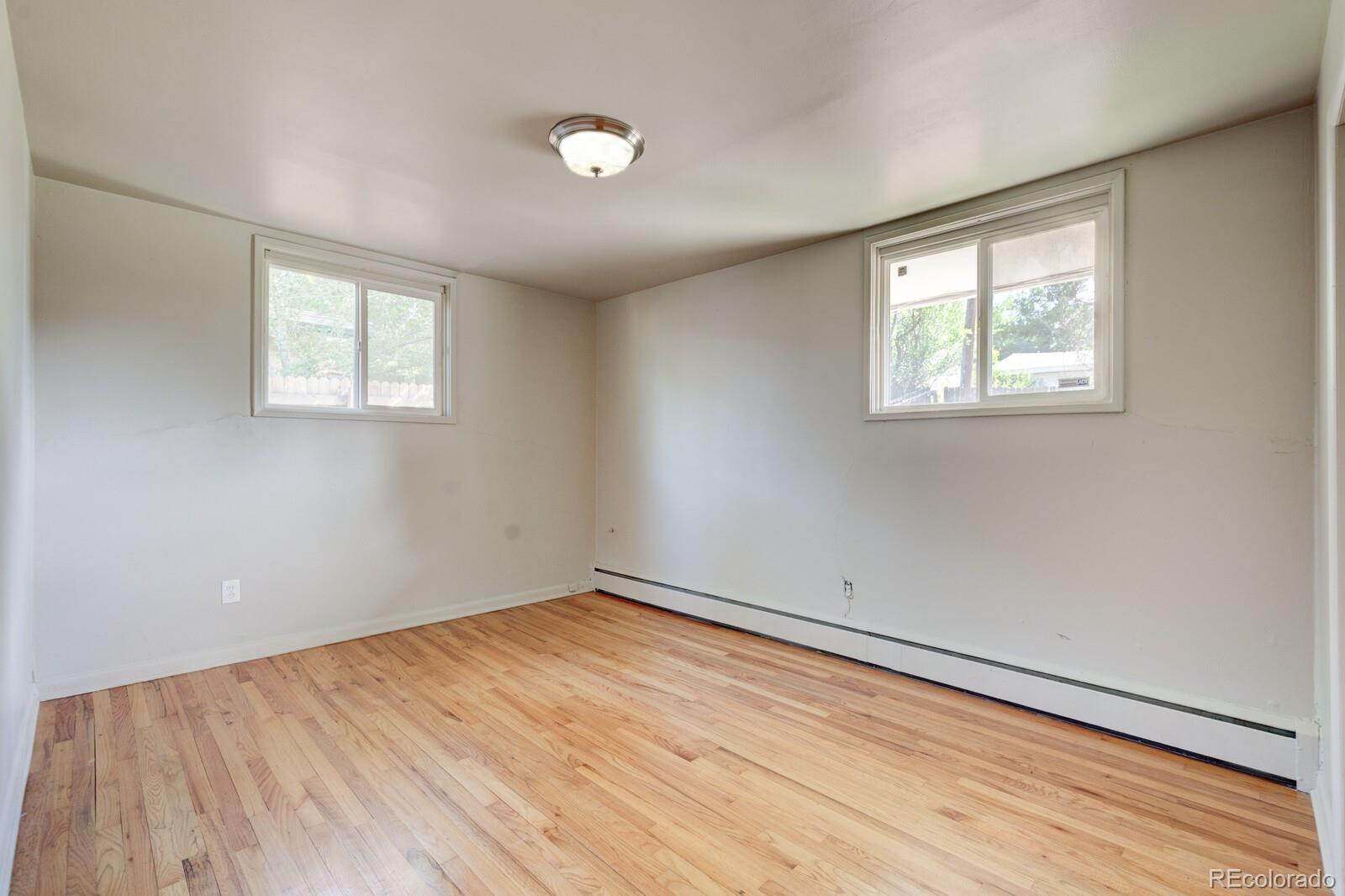 7928 Raleigh Place Westminster, CO 80030 - Photo 16 of 24 an empty room with a window