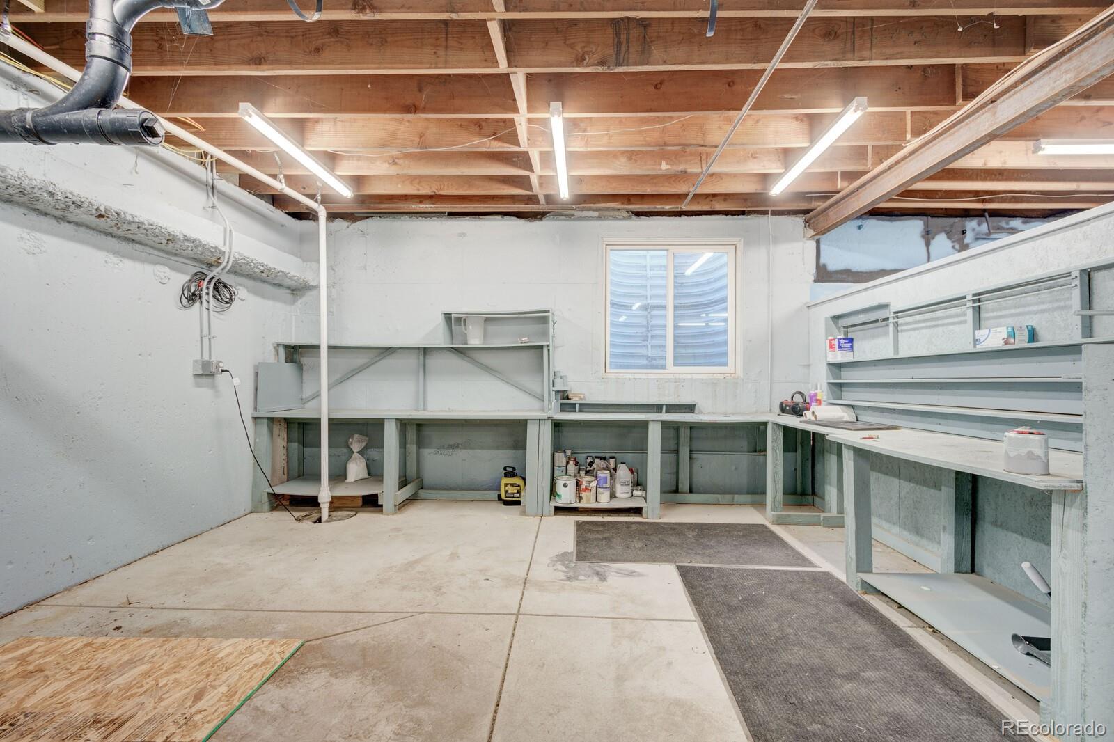 7928 Raleigh Place Westminster, CO 80030 - Photo 19 of 24 a view of a garage with chairs