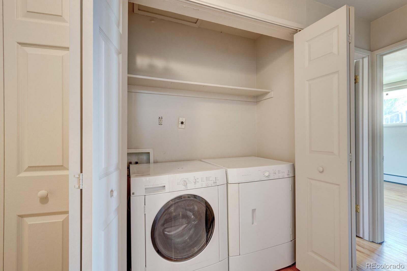 7928 Raleigh Place Westminster, CO 80030 - Photo 10 of 24 a utility room with dryer and washer