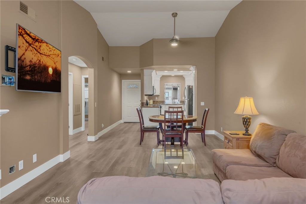 28 Vía Contento Rancho Santa Margarita, CA 92688 - Photo 14 of 61 a living room with furniture a window and a flat screen tv