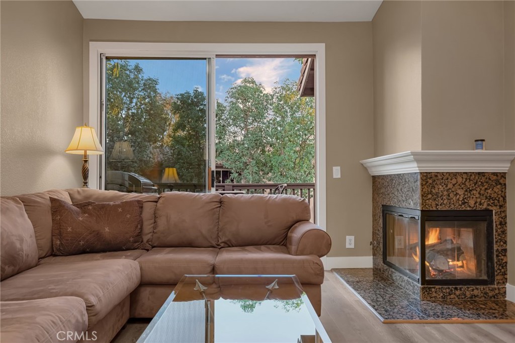 28 Vía Contento Rancho Santa Margarita, CA 92688 - Photo 18 of 61 a living room with furniture and a fireplace