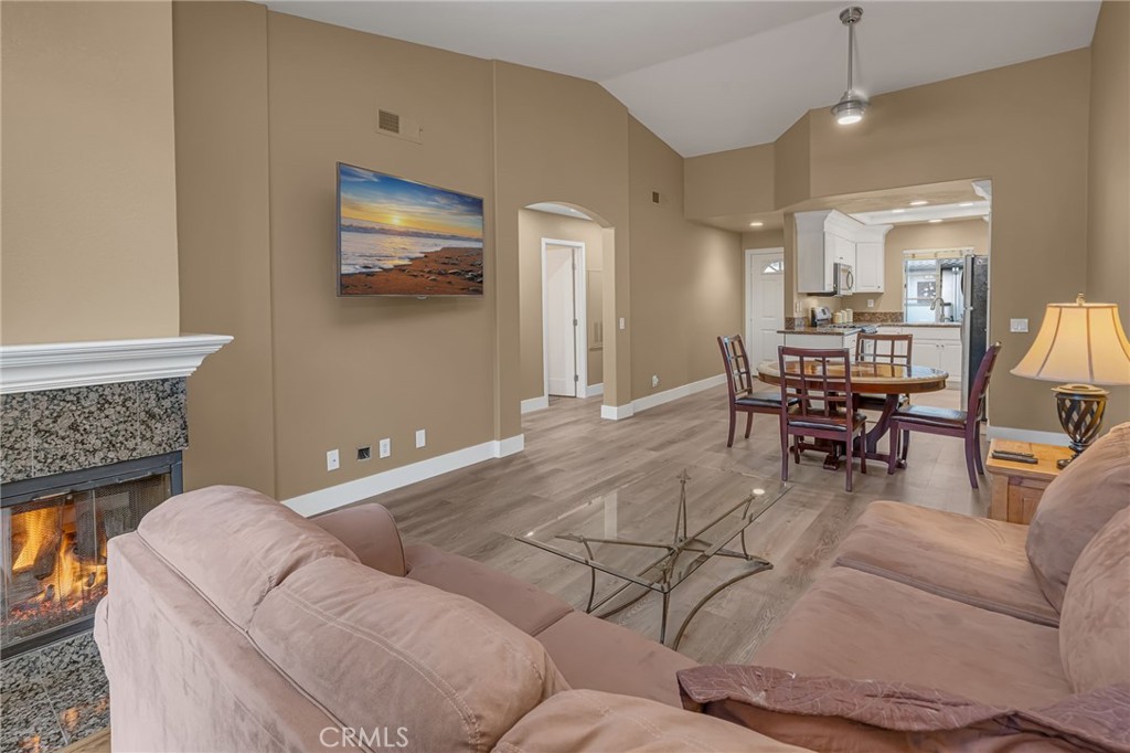 28 Vía Contento Rancho Santa Margarita, CA 92688 - Photo 19 of 61 a living room with furniture and wooden floor