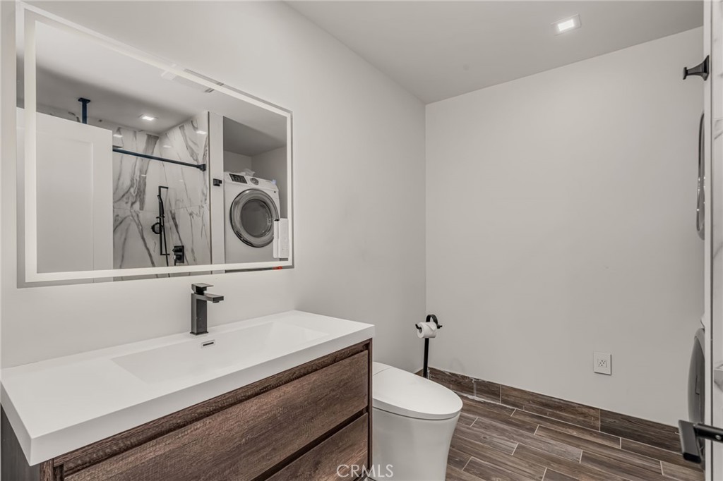 28 Vía Contento Rancho Santa Margarita, CA 92688 - Photo 20 of 61 a bathroom with a sink toilet and shower