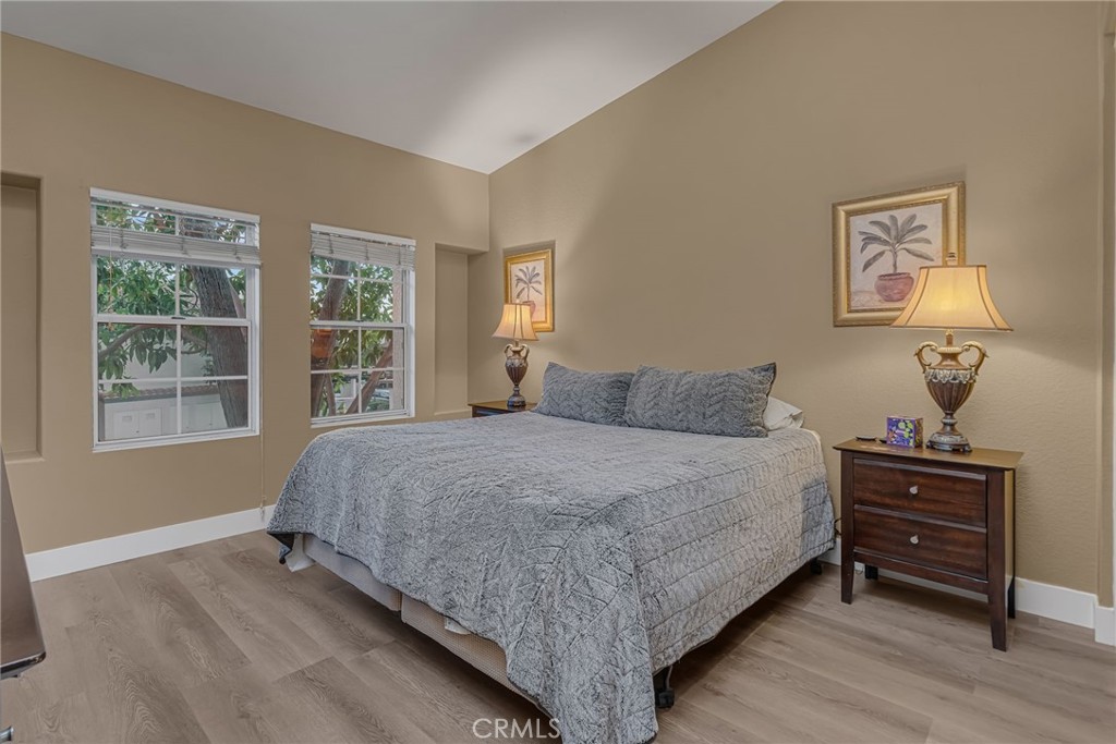 28 Vía Contento Rancho Santa Margarita, CA 92688 - Photo 24 of 61 a bedroom with a bed and a window