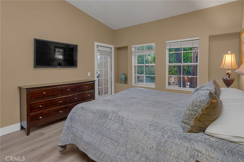 28 Vía Contento Rancho Santa Margarita, CA 92688 - Photo 26 of 61 a bedroom with a bed and a television