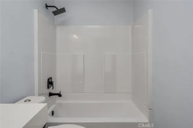 a view of a workspace with furniture