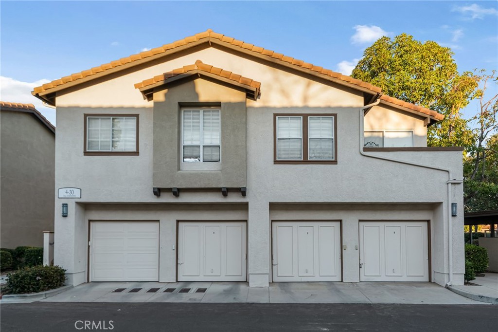 28 Vía Contento Rancho Santa Margarita, CA 92688 - Photo 36 of 61 a front view of a house with a garage