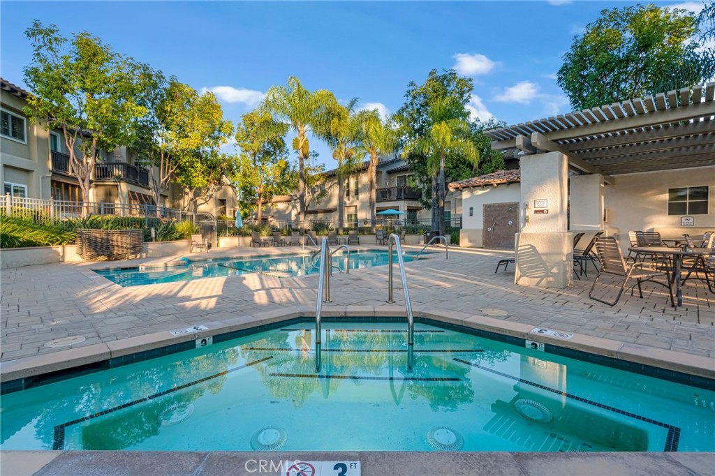 28 Vía Contento Rancho Santa Margarita, CA 92688 - Photo 43 of 61 a backyard of a house with table and chairs
