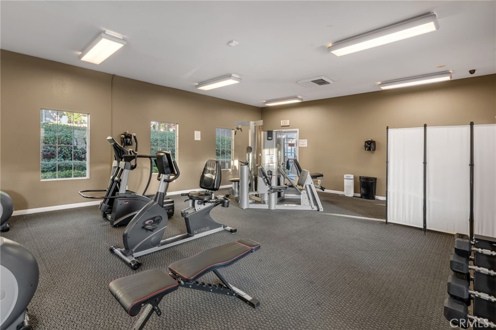 28 Vía Contento Rancho Santa Margarita, CA 92688 - Photo 50 of 61 a view of a room with gym equipment