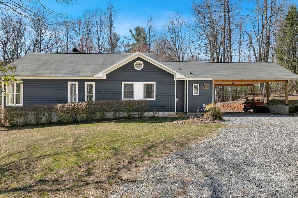 1881 Becky Mountain Road Brevard, NC 28712 - Photo 38 of 40 a house view with a garden space
