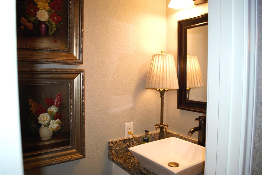1349 Roaring Springs Road Fort Worth, TX 76114 - Photo 12 of 30 Downstairs Half-Bathroom with vanity