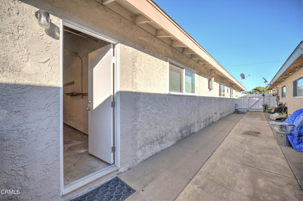 921 North M Street Oxnard, CA 93030 - Photo 14 of 14 a view of a back yard with wooden fence