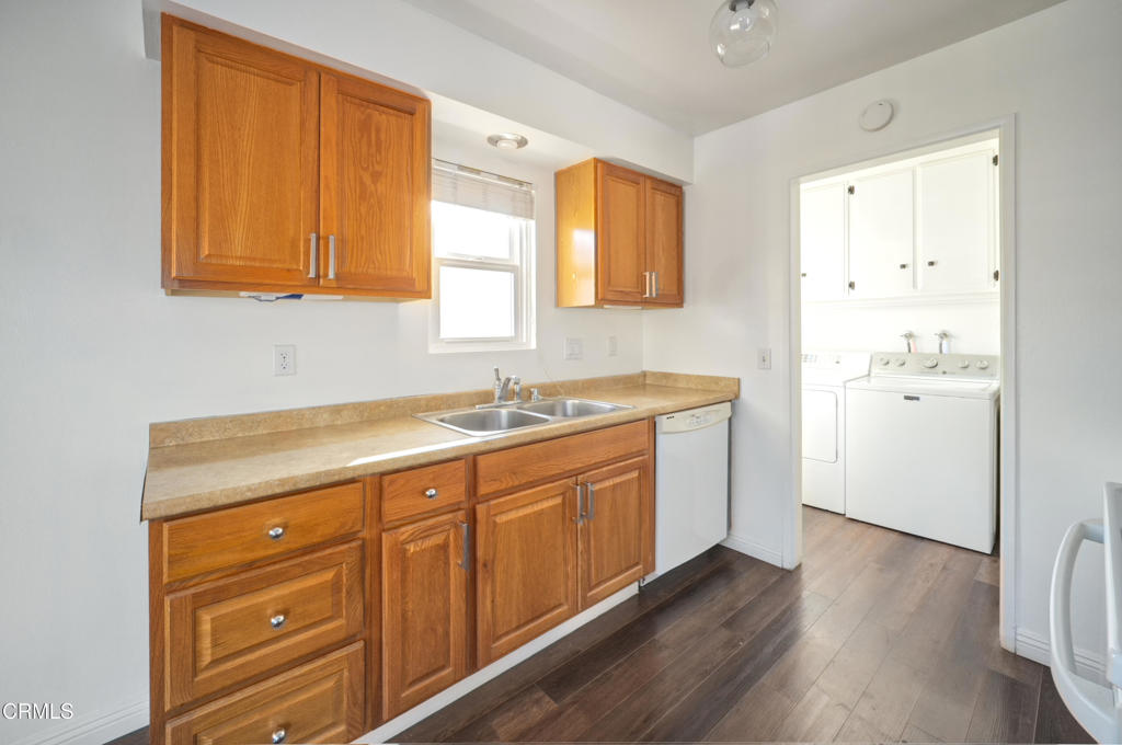 921 North M Street Oxnard, CA 93030 - Photo 6 of 14 a spacious bathroom with a granite countertop sink and a mirror
