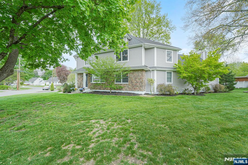 30 Oakley Way Wayne, NJ 07470 - Photo 2 of 43 a view of a house with backyard and garden