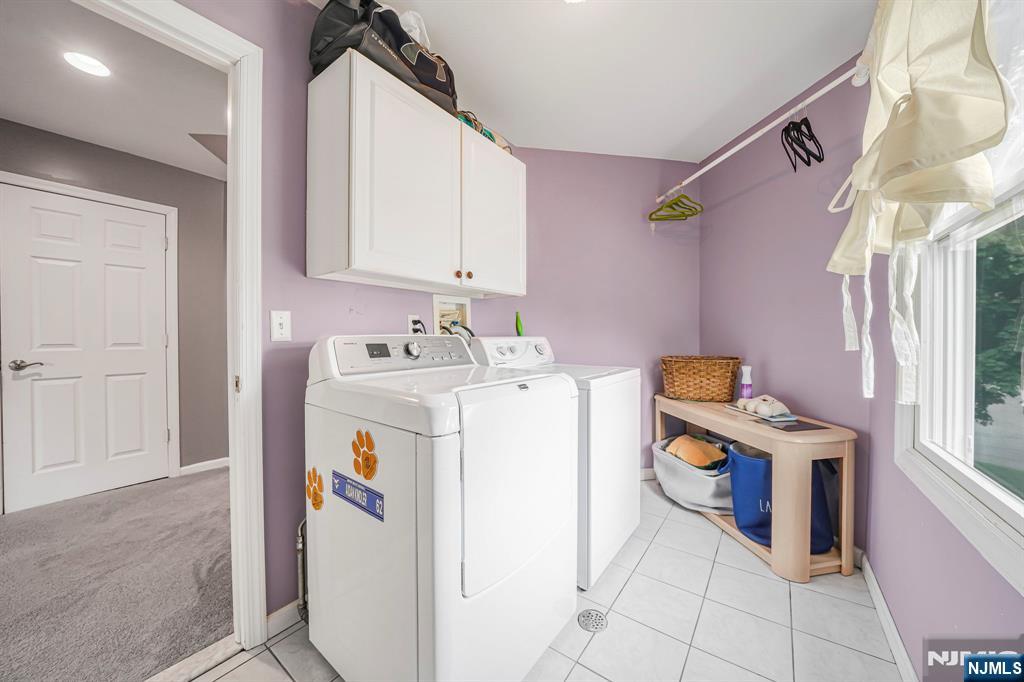 30 Oakley Way Wayne, NJ 07470 - Photo 30 of 43 a utility room with dryer and washer