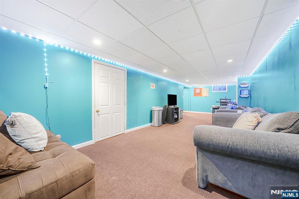 30 Oakley Way Wayne, NJ 07470 - Photo 31 of 43 a bedroom with furniture and a large window