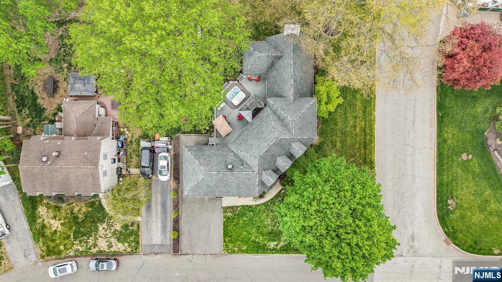 30 Oakley Way Wayne, NJ 07470 - Photo 41 of 43 an aerial view of a house with garden space and a street view