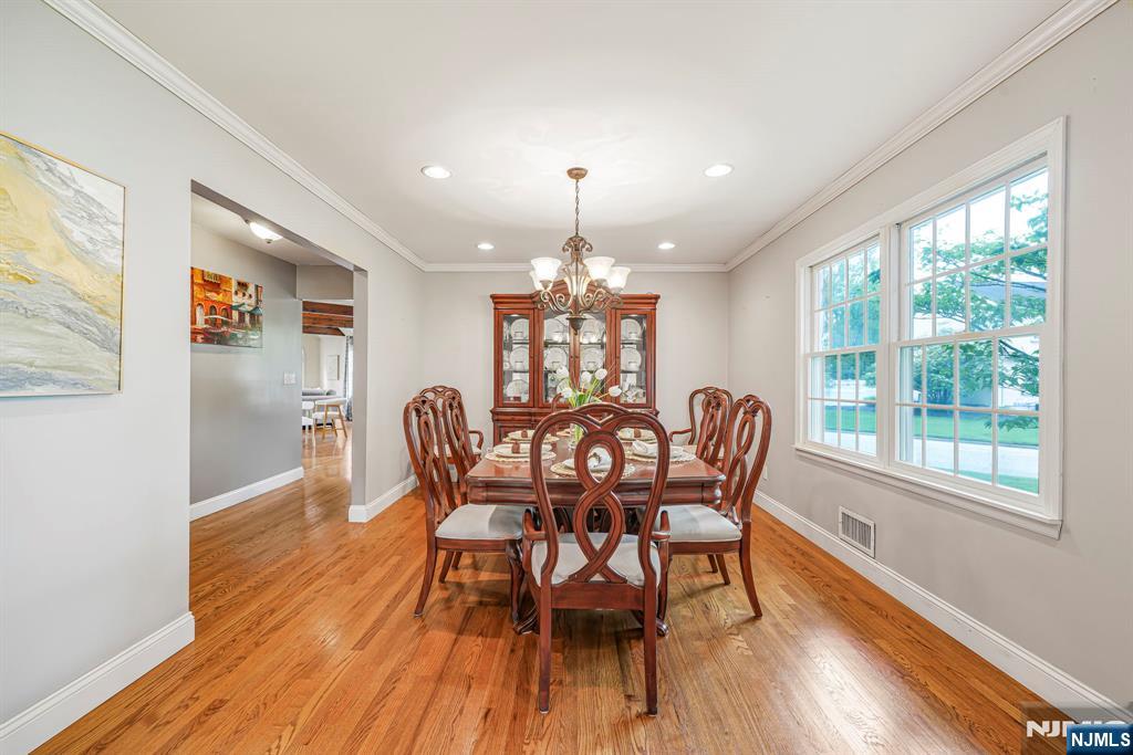30 Oakley Way Wayne, NJ 07470 - Photo 10 of 43 a dining room with furniture window wooden floor