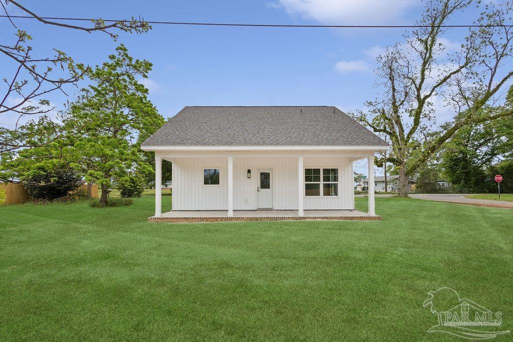 5307 Edeker Circle Jay, FL 32565 - Photo 24 of 28 a house view with a garden space
