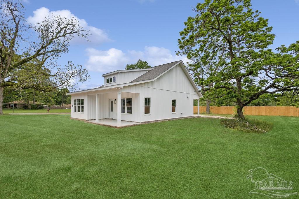 5307 Edeker Circle Jay, FL 32565 - Photo 25 of 28 a view of a house with a yard
