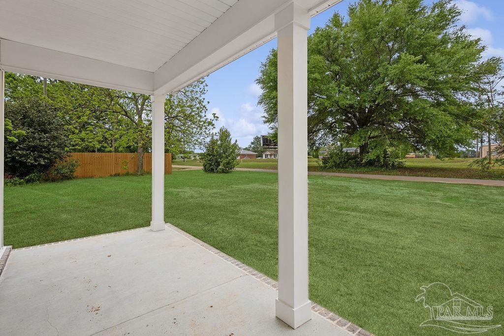 5307 Edeker Circle Jay, FL 32565 - Photo 3 of 28 a view of a garden with tall trees