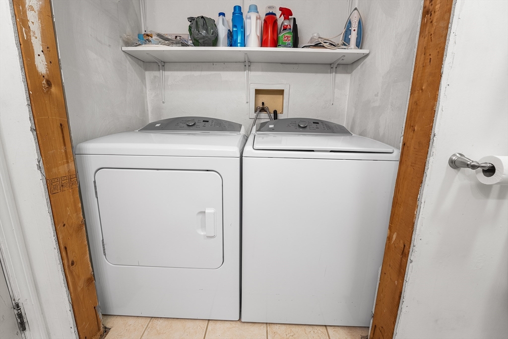 6 Erick Road, Unit 75 Mansfield, MA 02048 - Photo 11 of 20 a utility room with dryer and washer