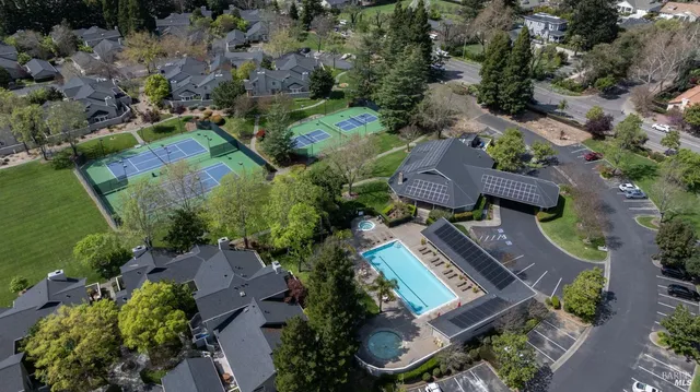 a view of a swimming pool with a patio