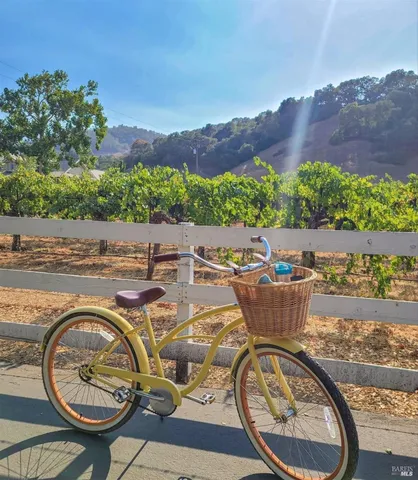 a view of a street with a houses on both side