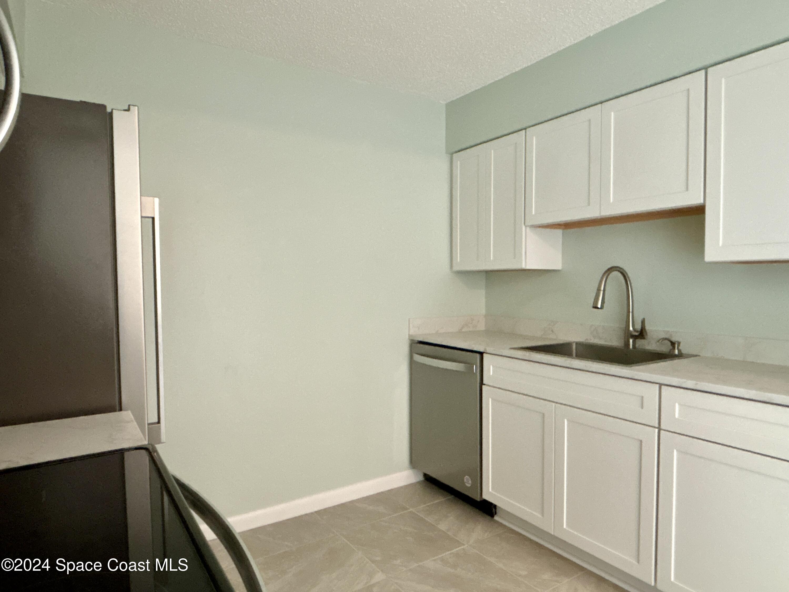 6028 Indrio Road, Unit M1 Fort Pierce, FL 34951 - Photo 11 of 32 DJI_20241119_114849_677