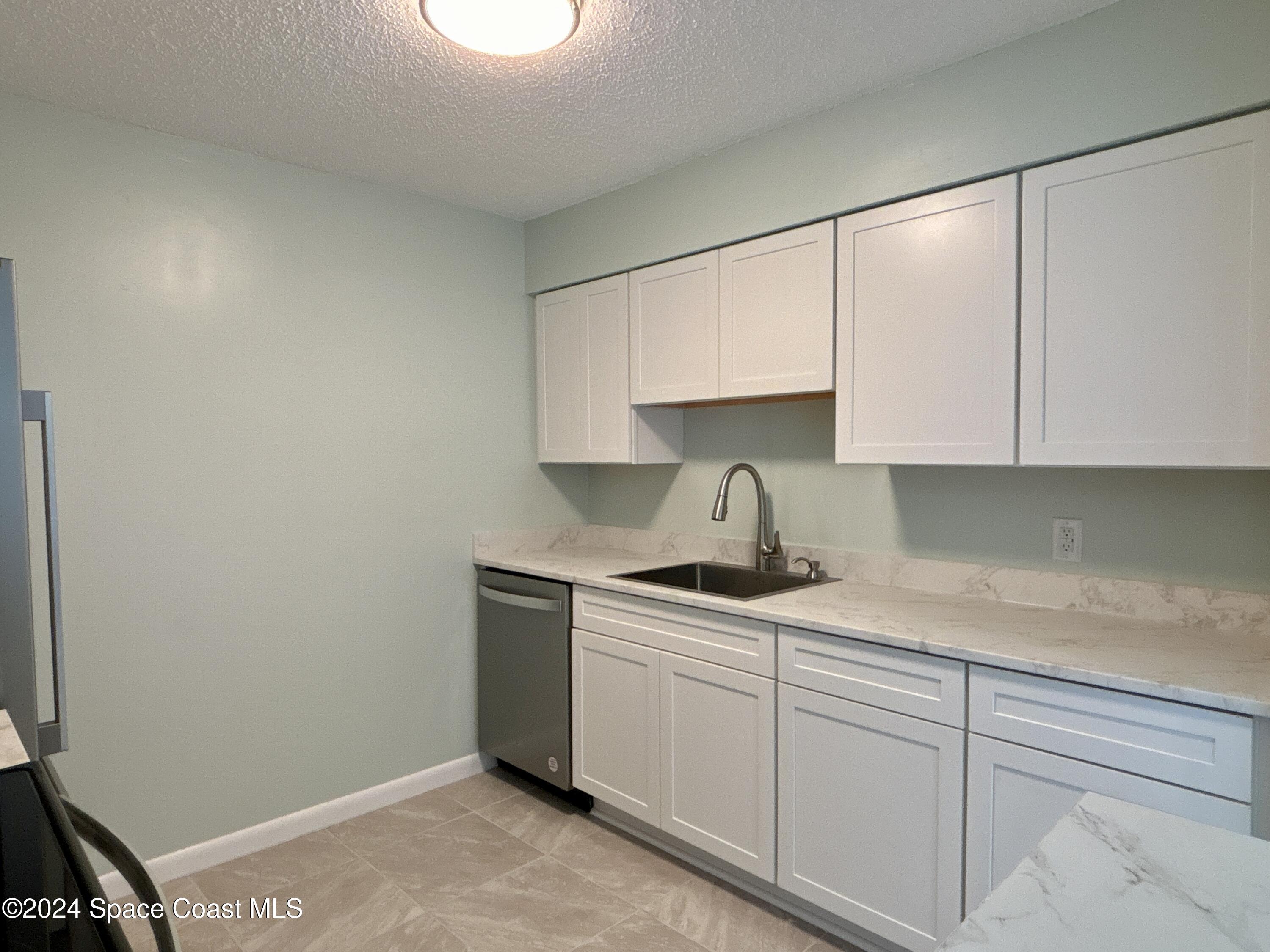 6028 Indrio Road, Unit M1 Fort Pierce, FL 34951 - Photo 12 of 32 DJI_20241119_114240_087