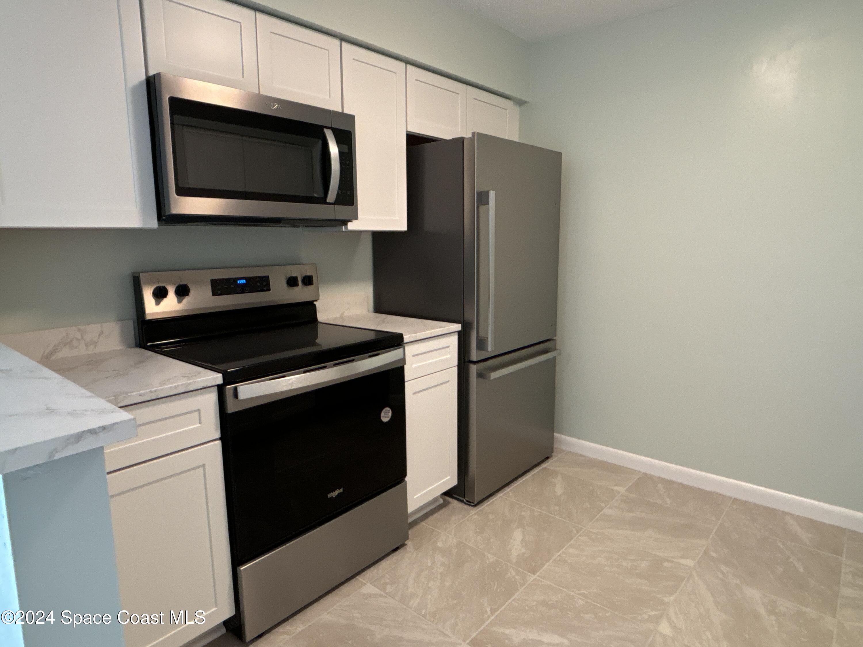 6028 Indrio Road, Unit M1 Fort Pierce, FL 34951 - Photo 13 of 32 DJI_20241119_114251_137