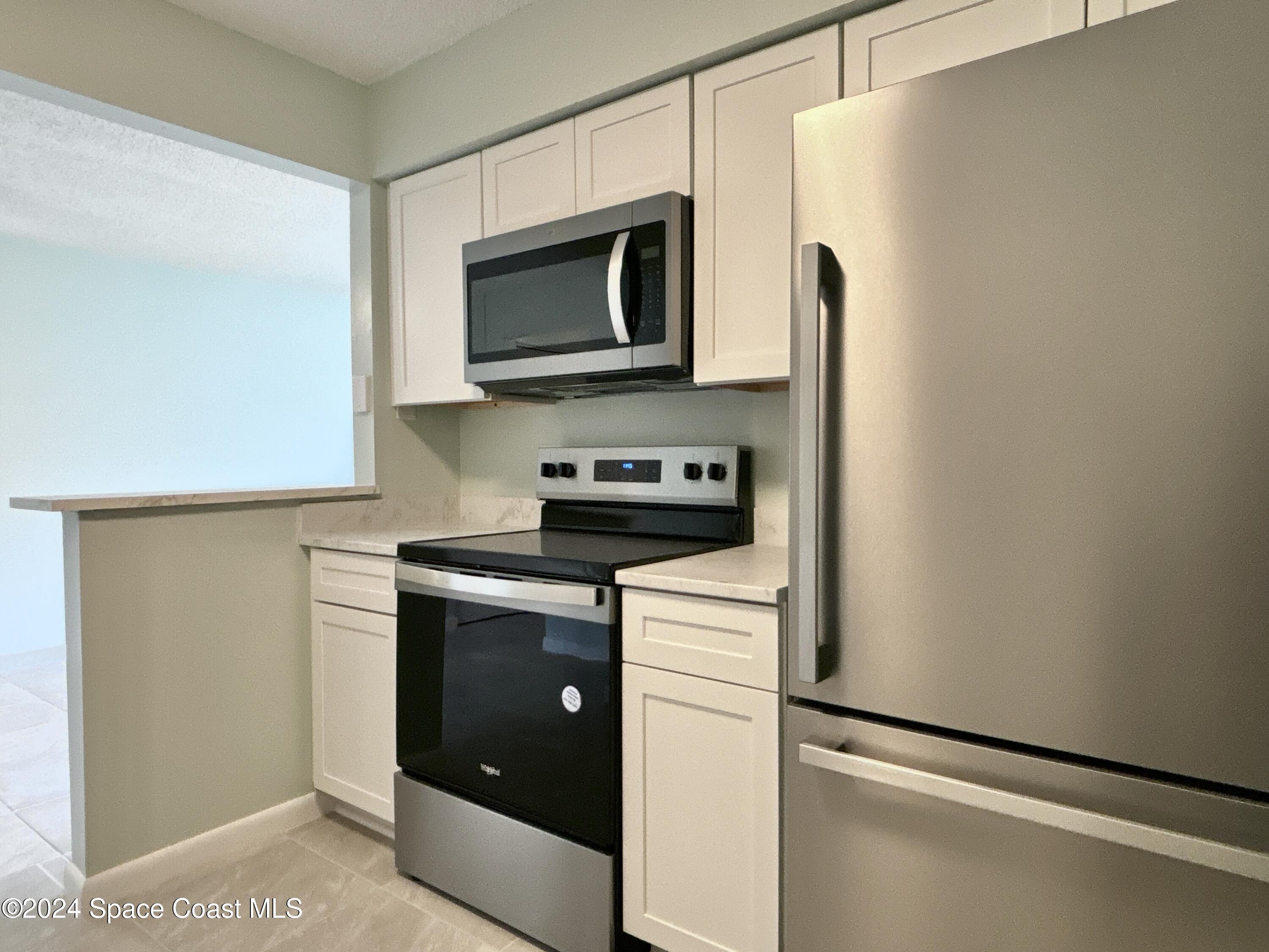 6028 Indrio Road, Unit M1 Fort Pierce, FL 34951 - Photo 14 of 32 DJI_20241119_114451_773