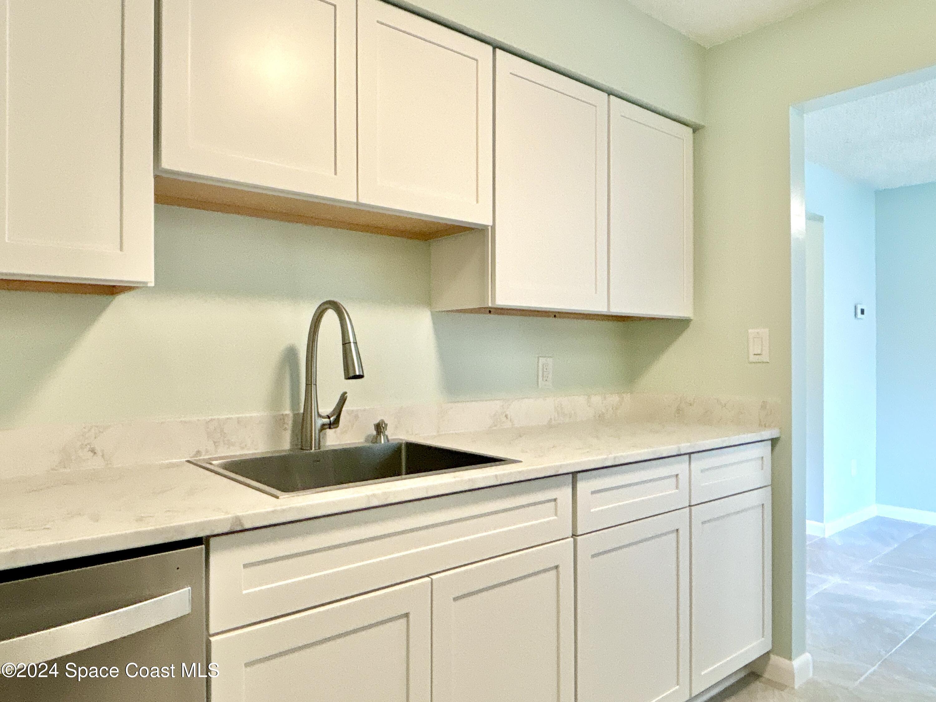 6028 Indrio Road, Unit M1 Fort Pierce, FL 34951 - Photo 15 of 32 DJI_20241119_114442_654