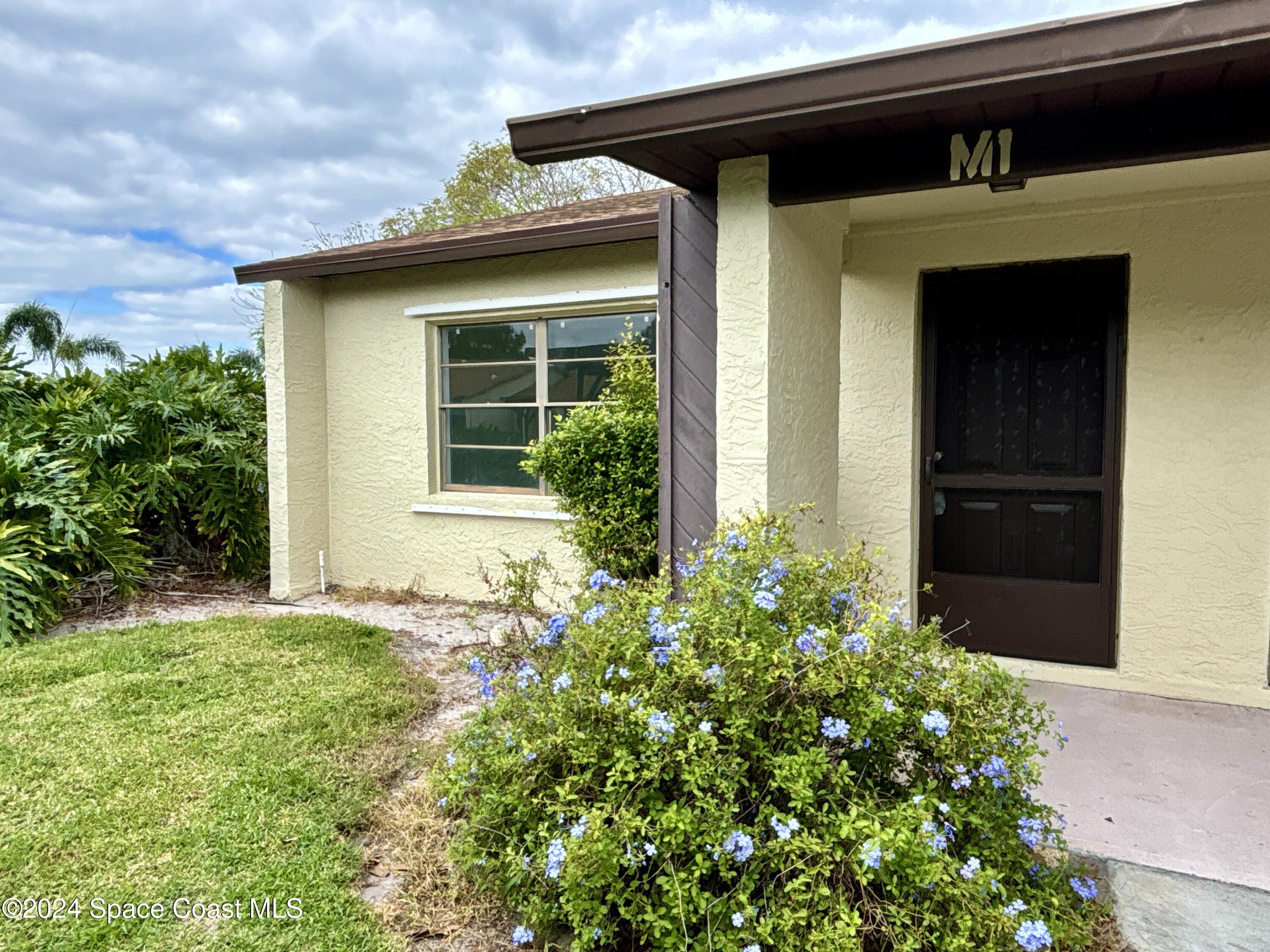 6028 Indrio Road, Unit M1 Fort Pierce, FL 34951 - Photo 4 of 32 DJI_20241119_115958_817