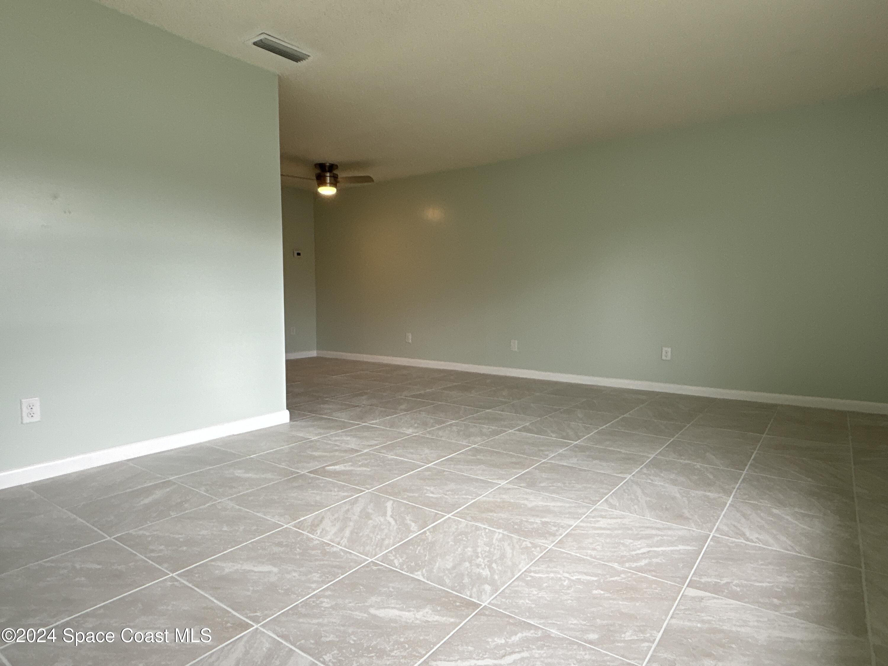 6028 Indrio Road, Unit M1 Fort Pierce, FL 34951 - Photo 6 of 32 DJI_20241119_114404_892