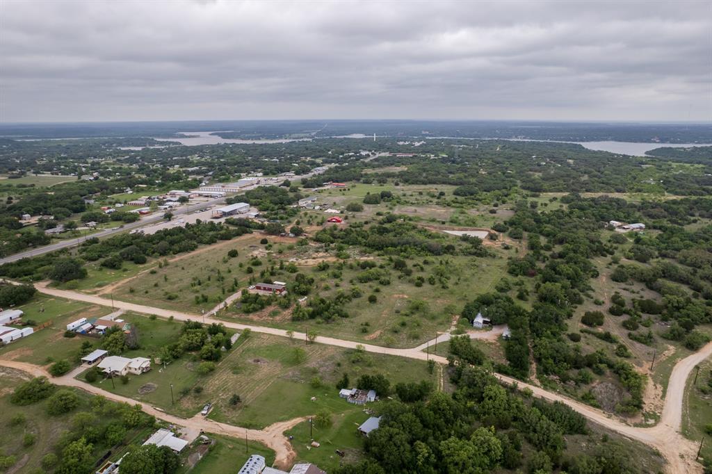 6723 Hidden Valley Road Brownwood, TX 76801 - Photo 5 of 6 an aerial view of residential houses with outdoor space