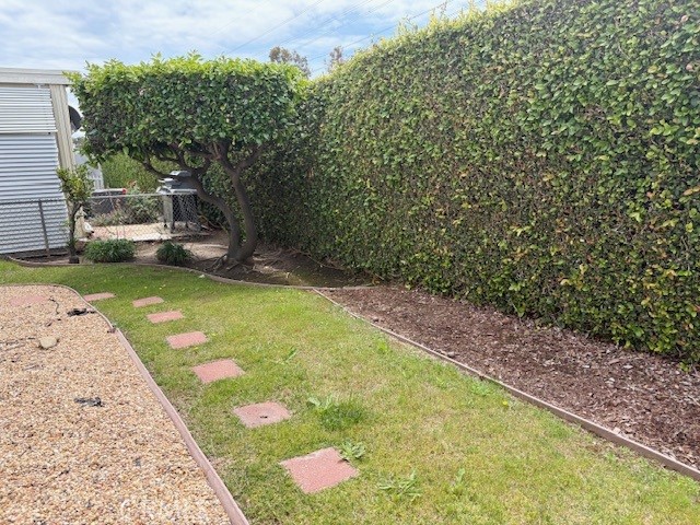 14851 Jeffrey Road, Unit 331 Irvine, CA 92618 - Photo 11 of 12 a view of a backyard with a garden