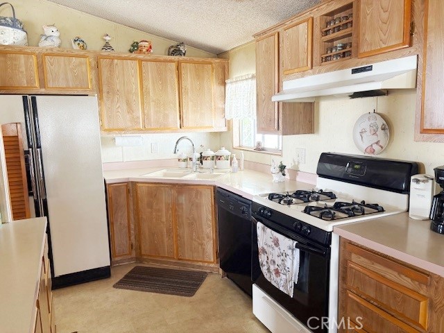 14851 Jeffrey Road, Unit 331 Irvine, CA 92618 - Photo 4 of 12 a kitchen with stainless steel appliances granite countertop a stove a refrigerator and a sink