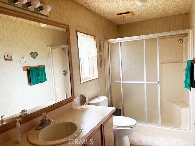 14851 Jeffrey Road, Unit 331 Irvine, CA 92618 - Photo 8 of 12 a bathroom with a sink a toilet and shower