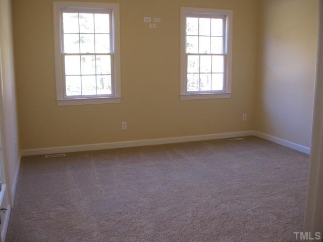 1404 G W Court Raleigh, NC 27603 - Photo 13 of 25 an empty room with a window
