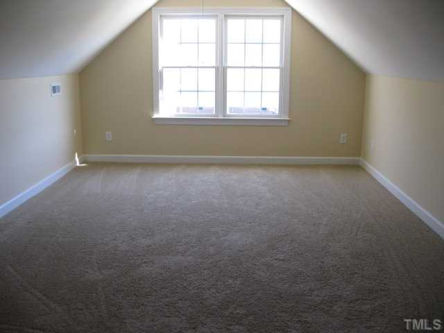 1404 G W Court Raleigh, NC 27603 - Photo 19 of 25 an empty room with a window