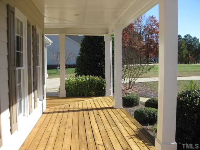 1404 G W Court Raleigh, NC 27603 - Photo 2 of 25 a view of a house with a garden