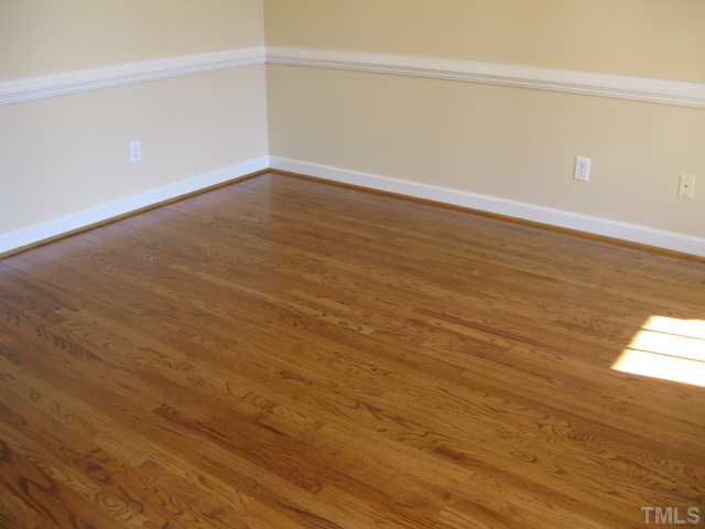 1404 G W Court Raleigh, NC 27603 - Photo 9 of 25 wooden floor in an empty room