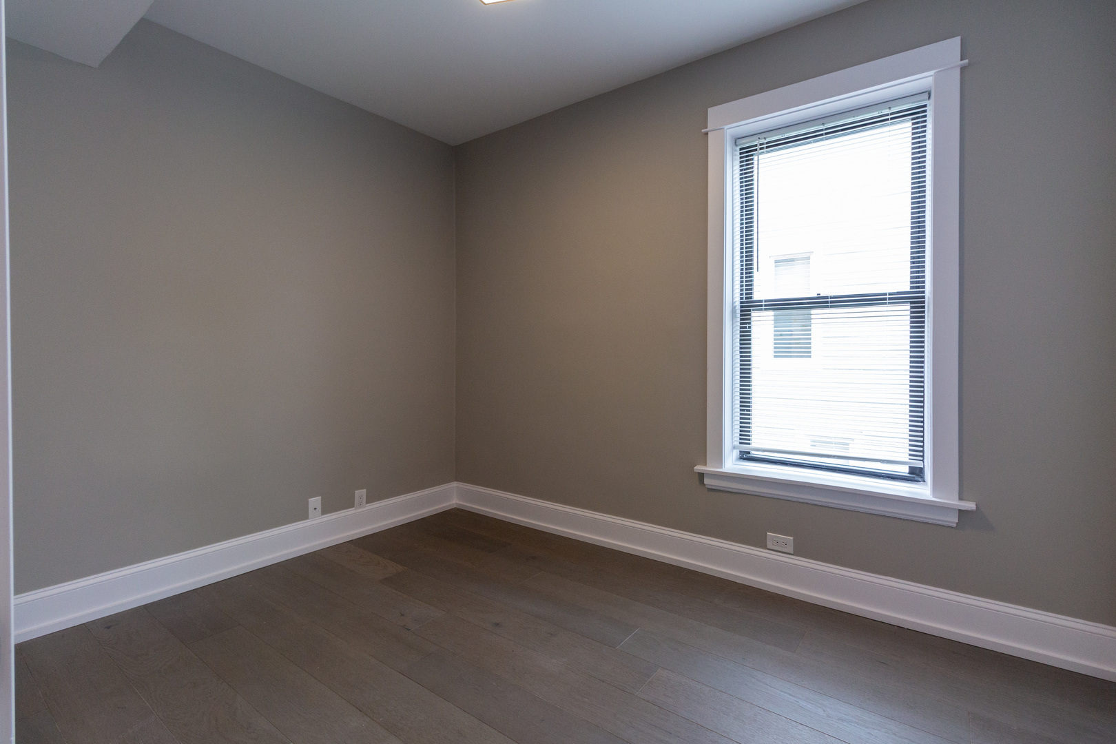 3755 West Addison Street, Unit 2E Chicago, IL 60618 - Photo 14 of 20 an empty room with a window