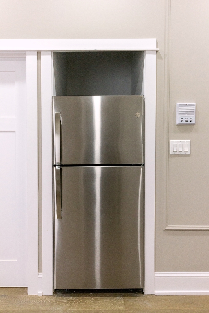 3755 West Addison Street, Unit 2E Chicago, IL 60618 - Photo 6 of 20 a view of a refrigerator in a kitchen